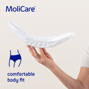MoliCare product with a hand holding it against a light background